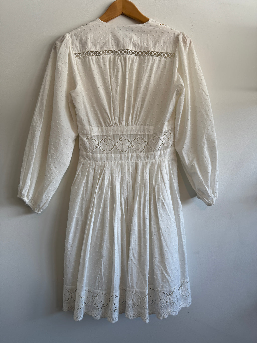 White lace dress on a white background