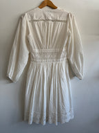 White lace dress on a white background