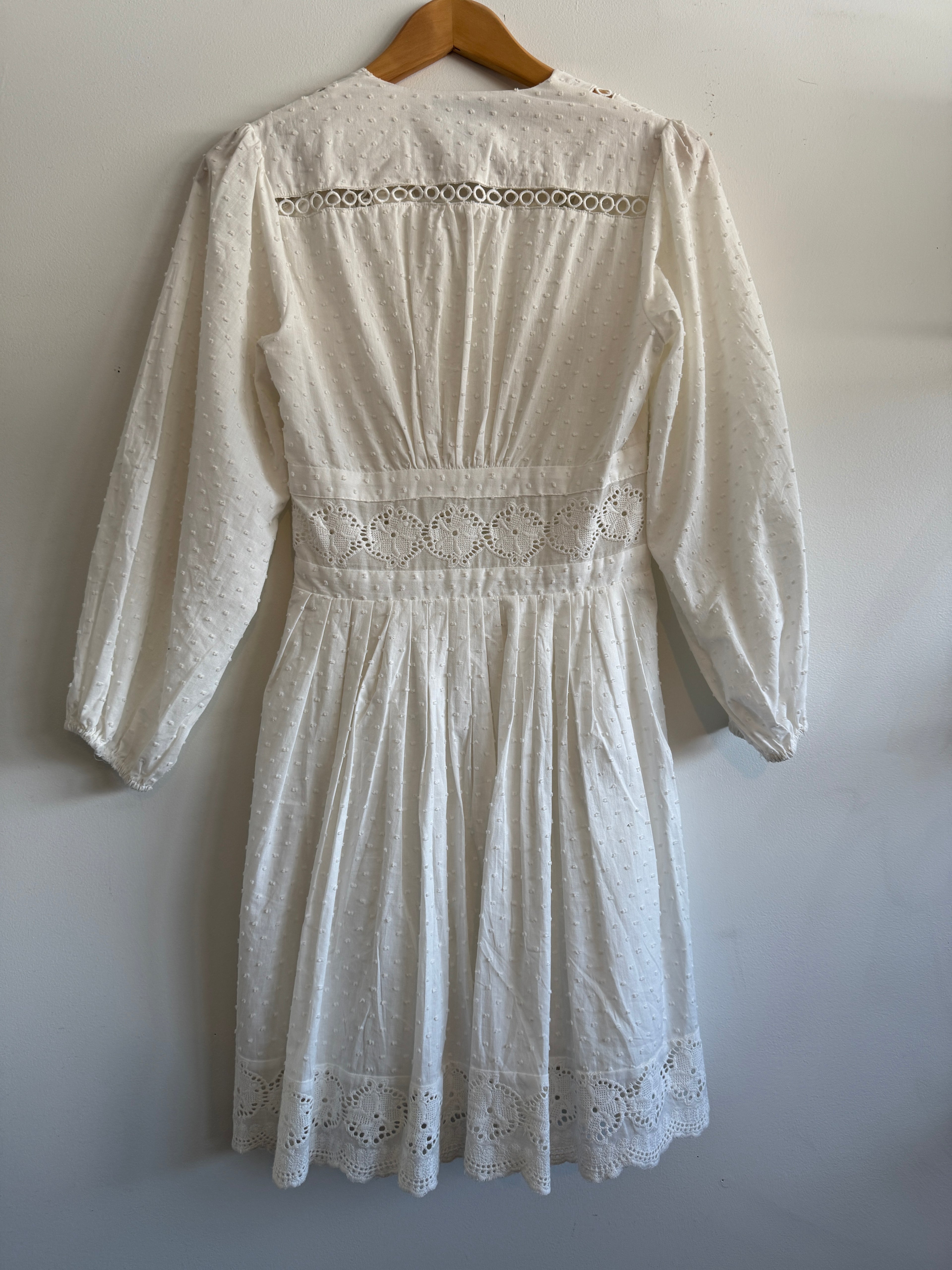 White lace dress on a white background