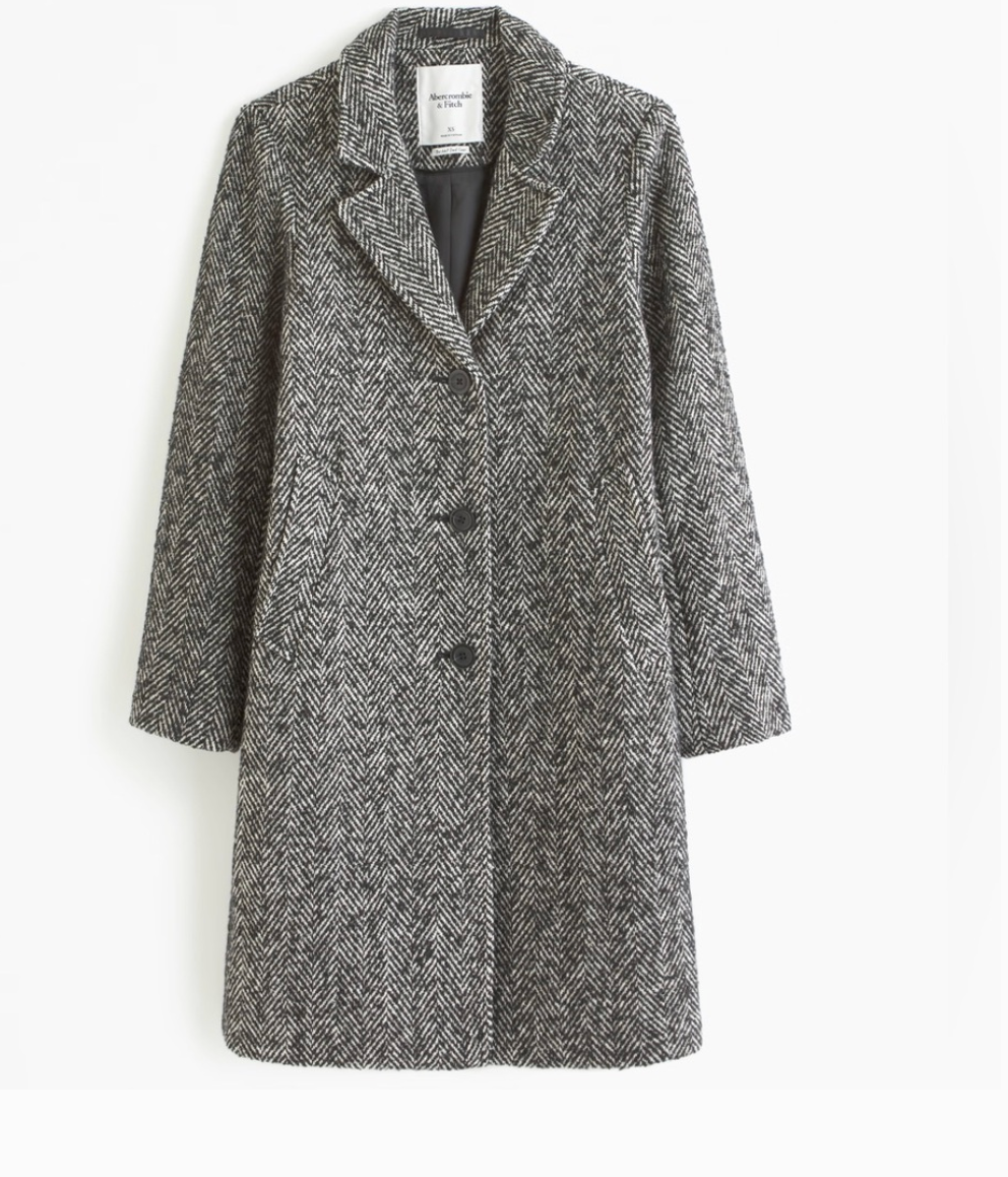 Gray patterned coat on a white background