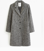 Gray patterned coat on a white background