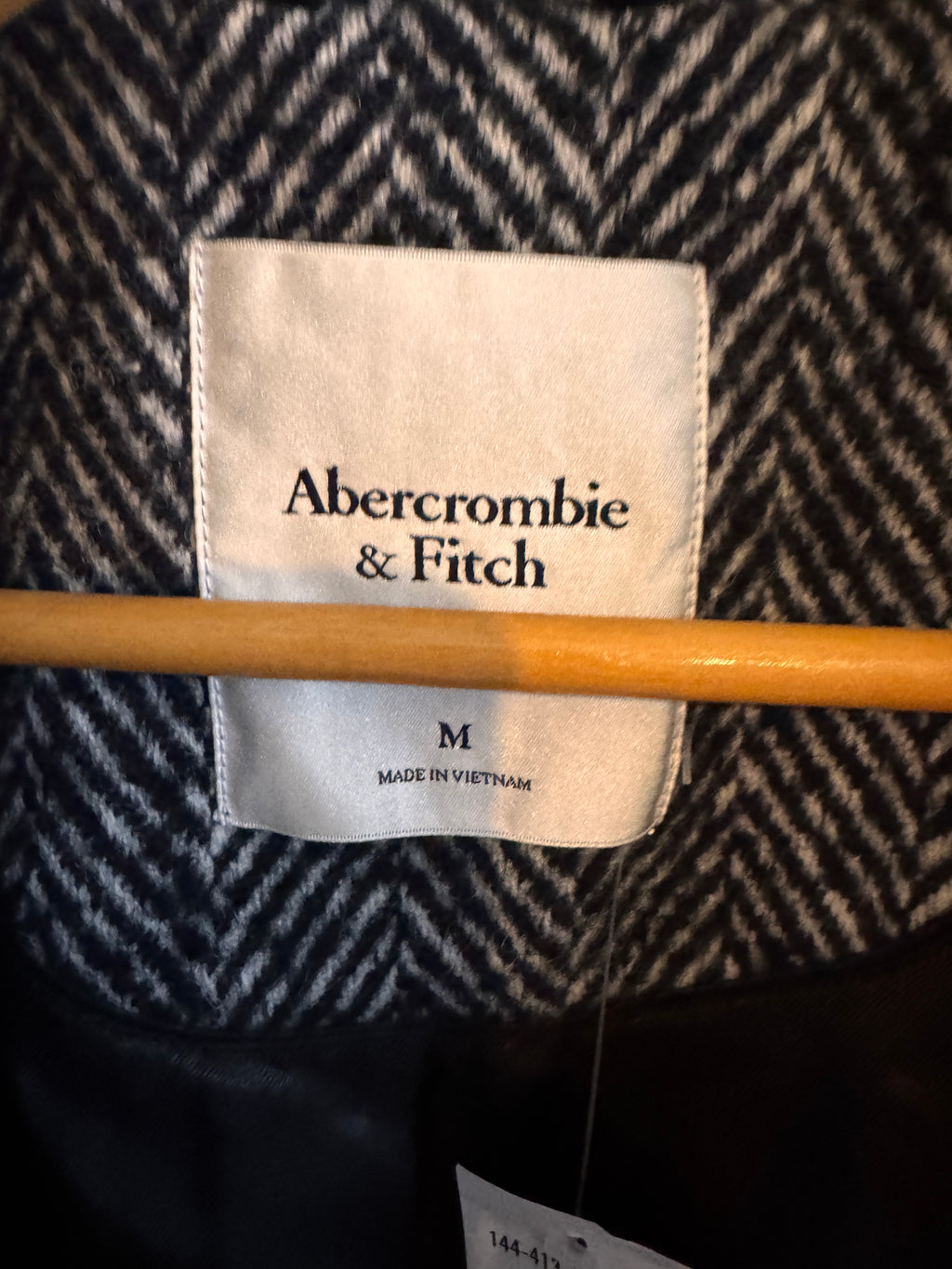 Abercrombie & Fitch label on a textured fabric background