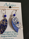 Blue and silver earrings on an Adajio jewelry card.