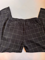 Black checkered pants on a light background