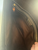 Zipper closure inside pocket of Banana Republic clutch with bamboo zipper