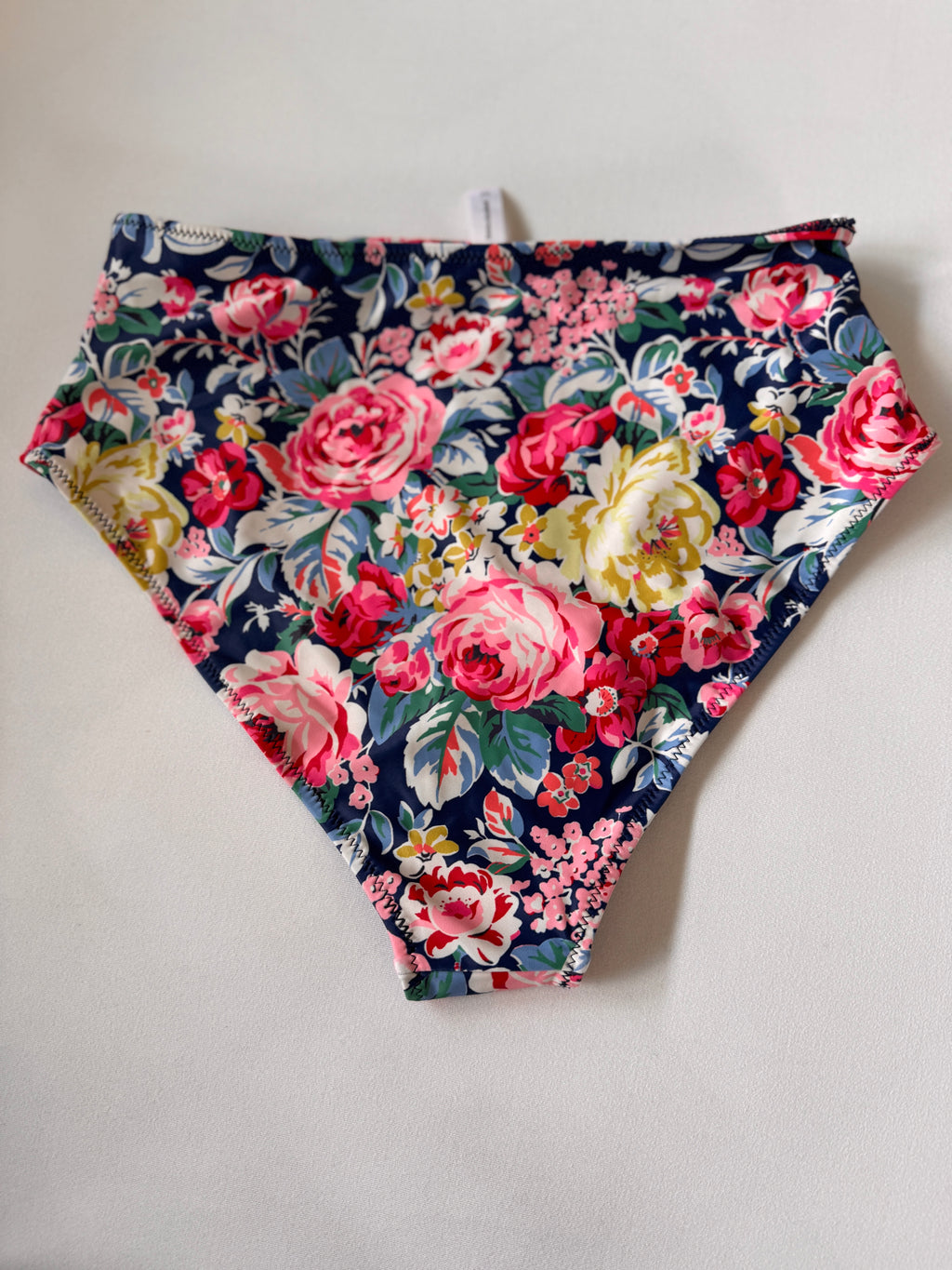 Floral-patterned underwear on a light gray background