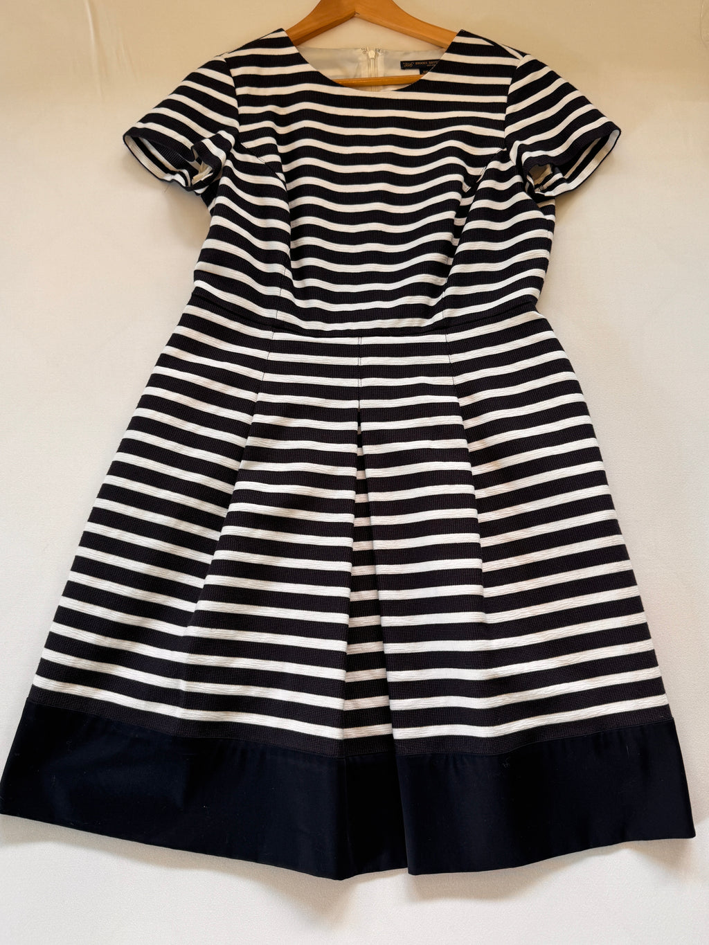 Striped dress on white background