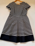 Striped dress on white background