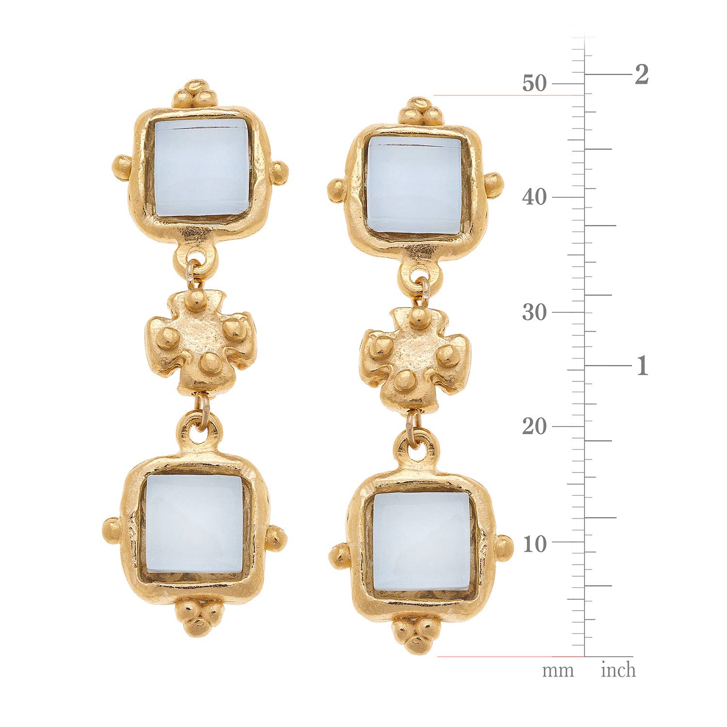 Gold earrings with square stones and measurement scale on a white background