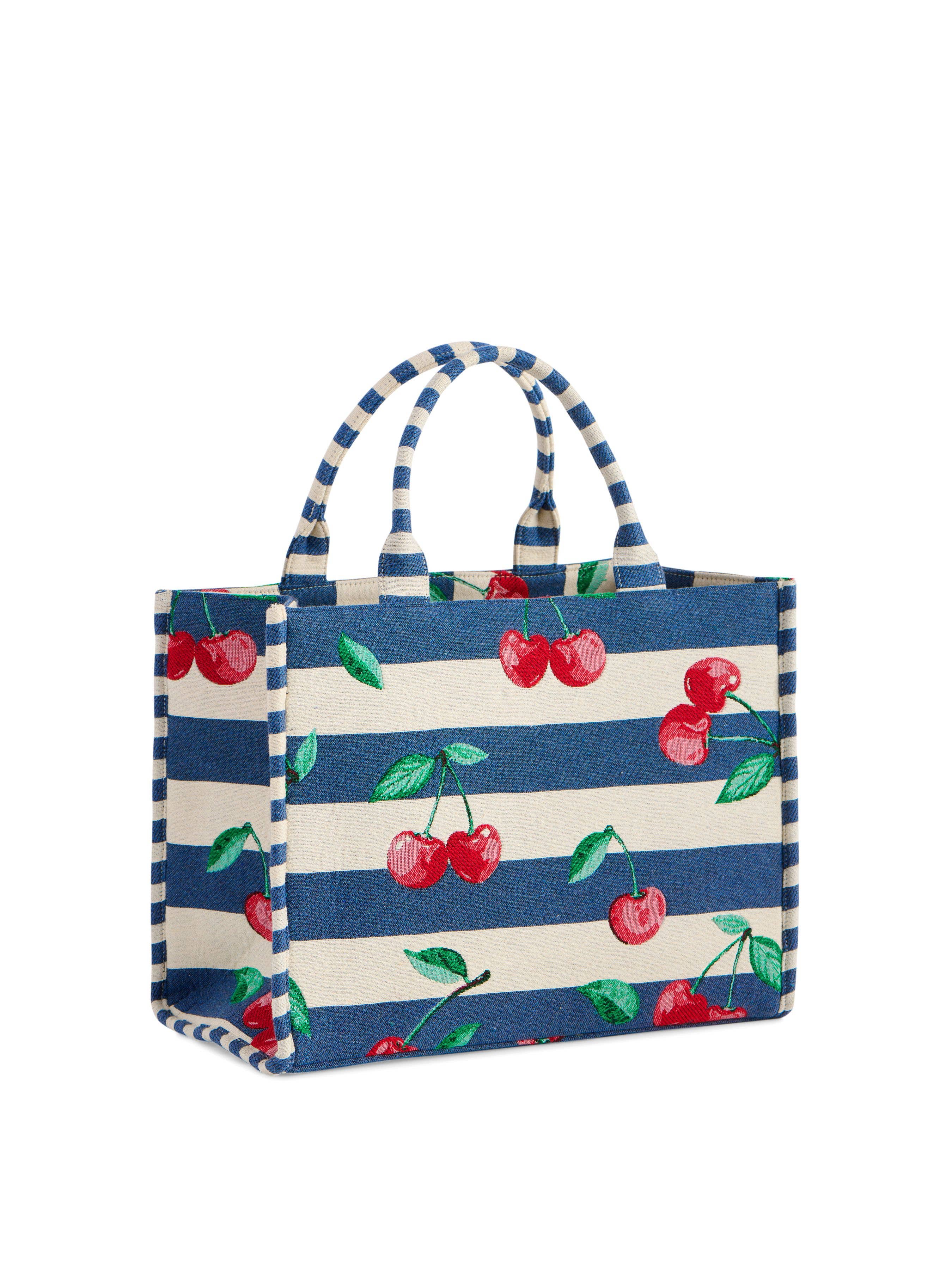 Tote bag with blue and white striped pattern and red cherry design on a white background