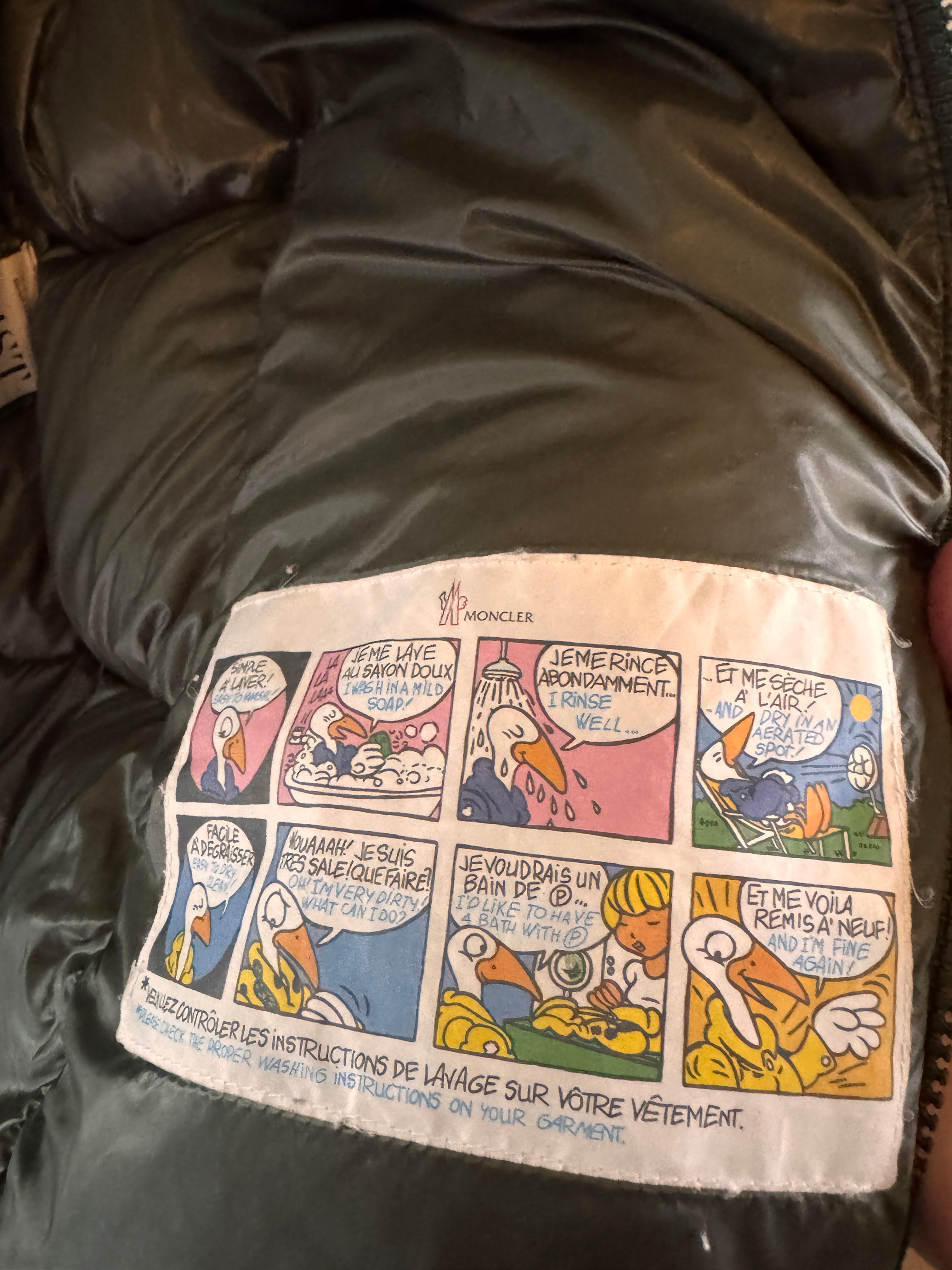 Comic strip design on a piece of paper attached to a dark fabric surface