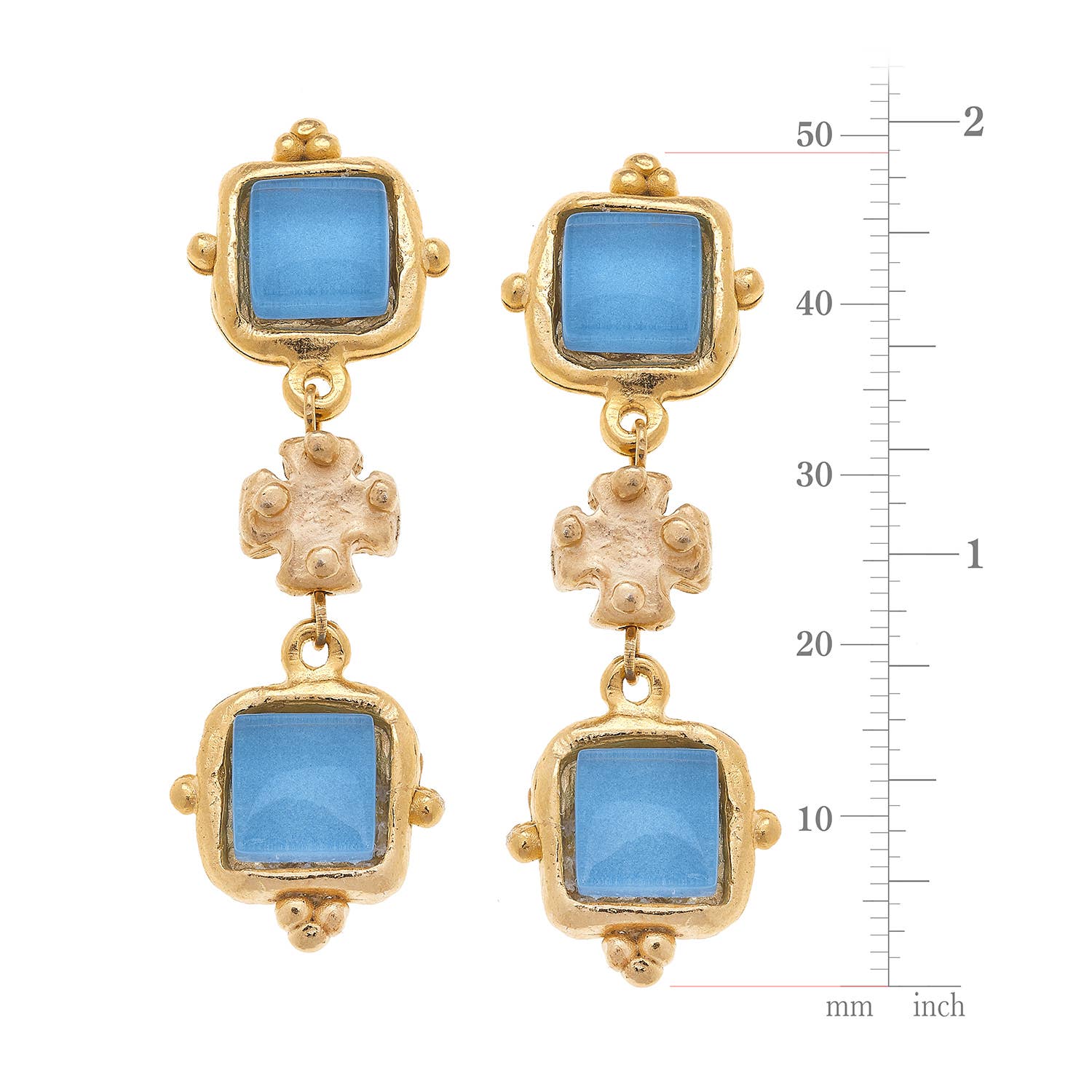 Gold earrings with blue square stones and measurement scale on a white background