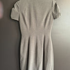 Beige dress on a gray background