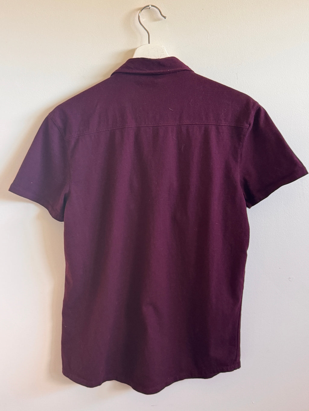 Burgundy shirt on a white background