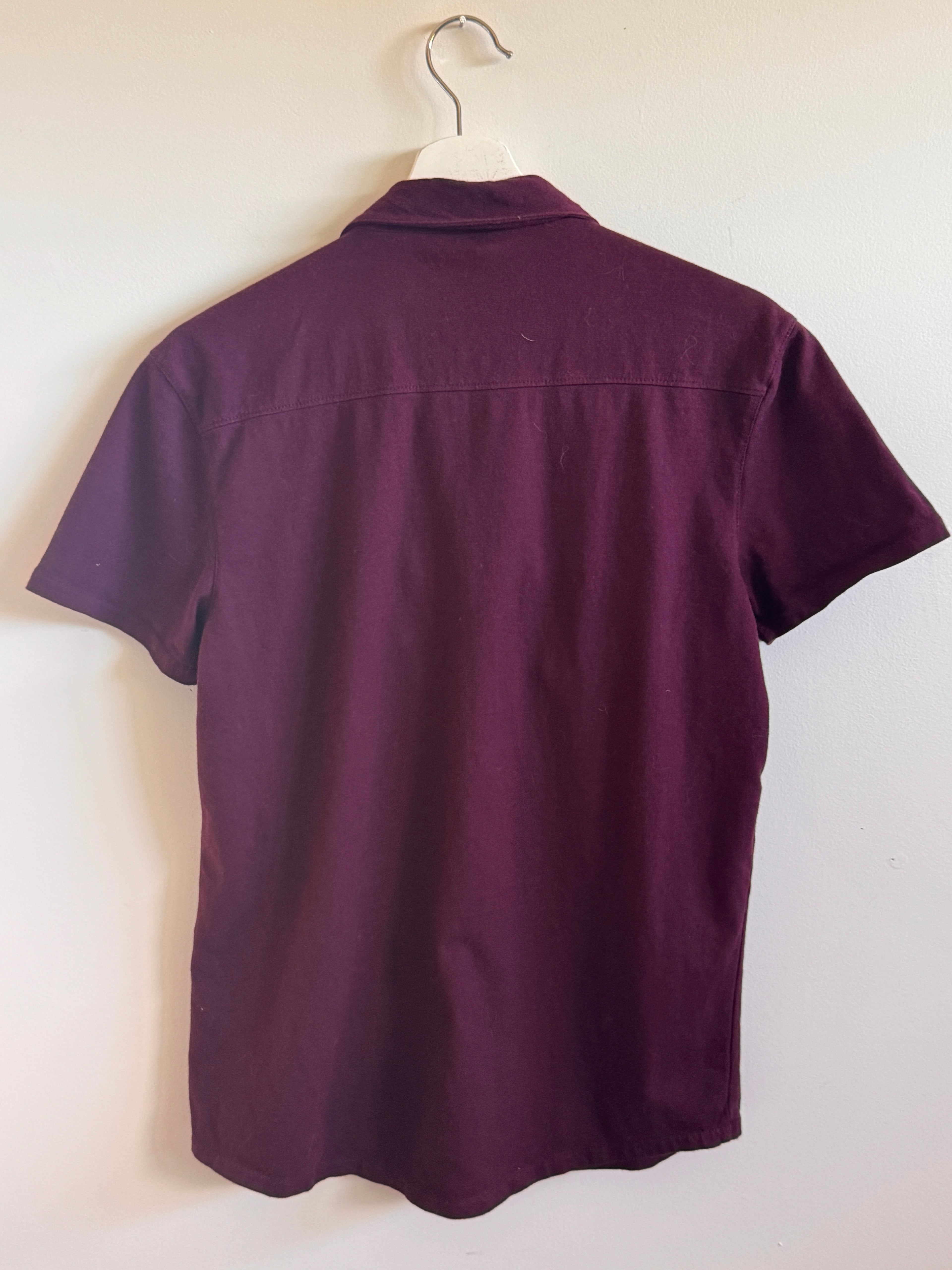 Burgundy shirt on a white background