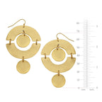Gold earrings with a circular design on a white background with measurement scale.