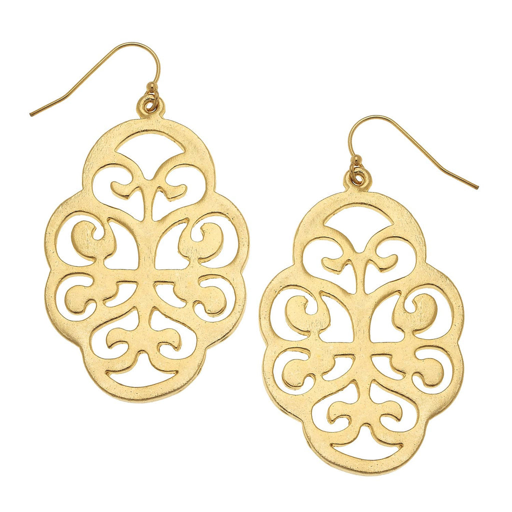 Gold filigree earrings on a white background