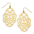 Gold filigree earrings on a white background