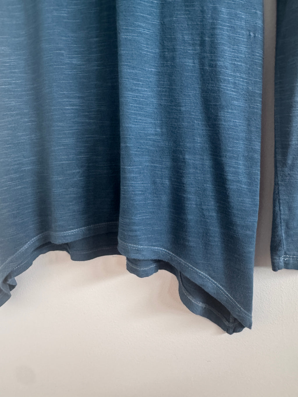 Blue Top hemline on white background