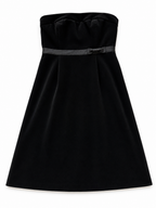 Black strapless dress with a bow detail on a white background
