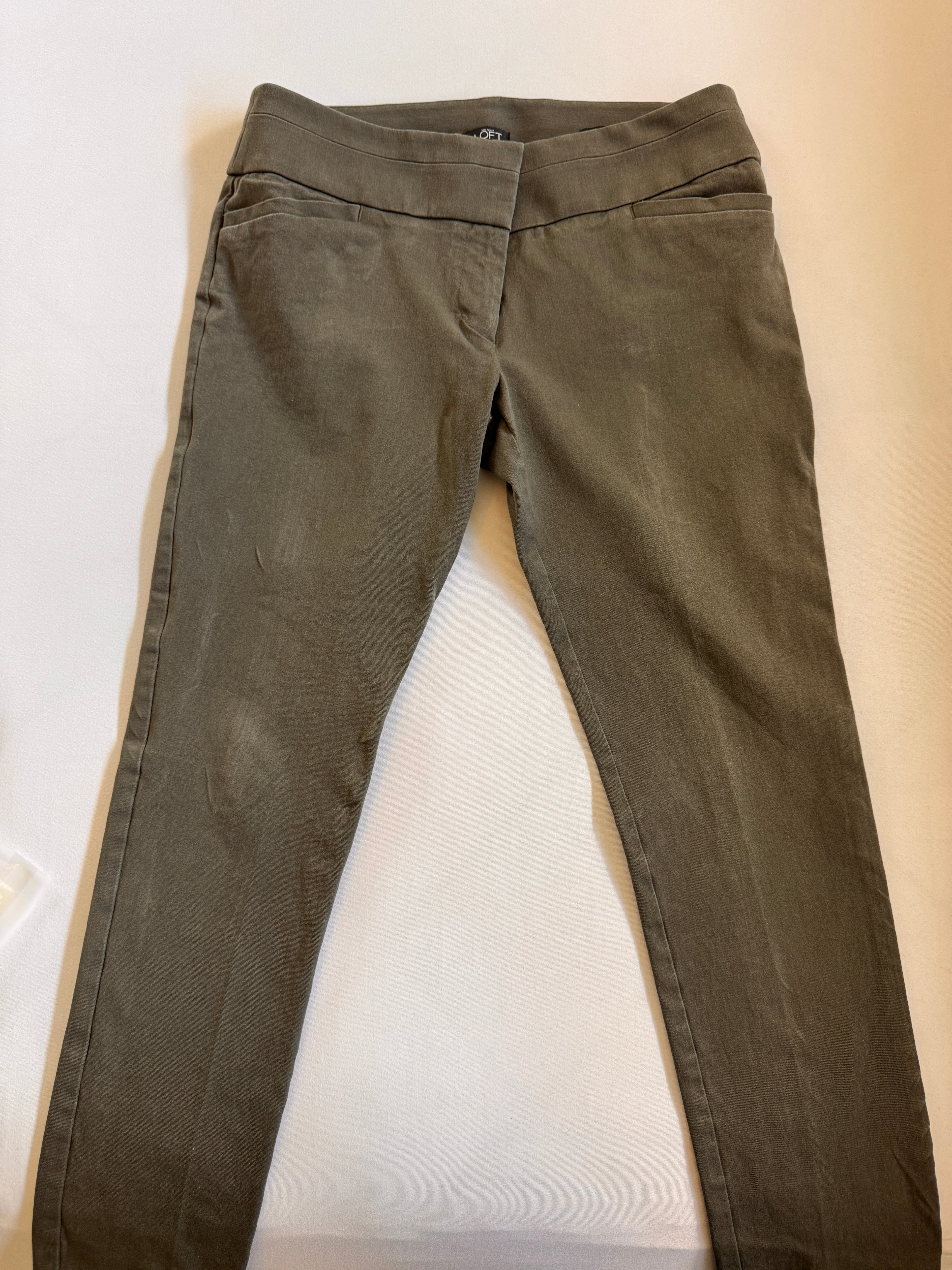 Marisa Skinny Pants laying flat on a white surface