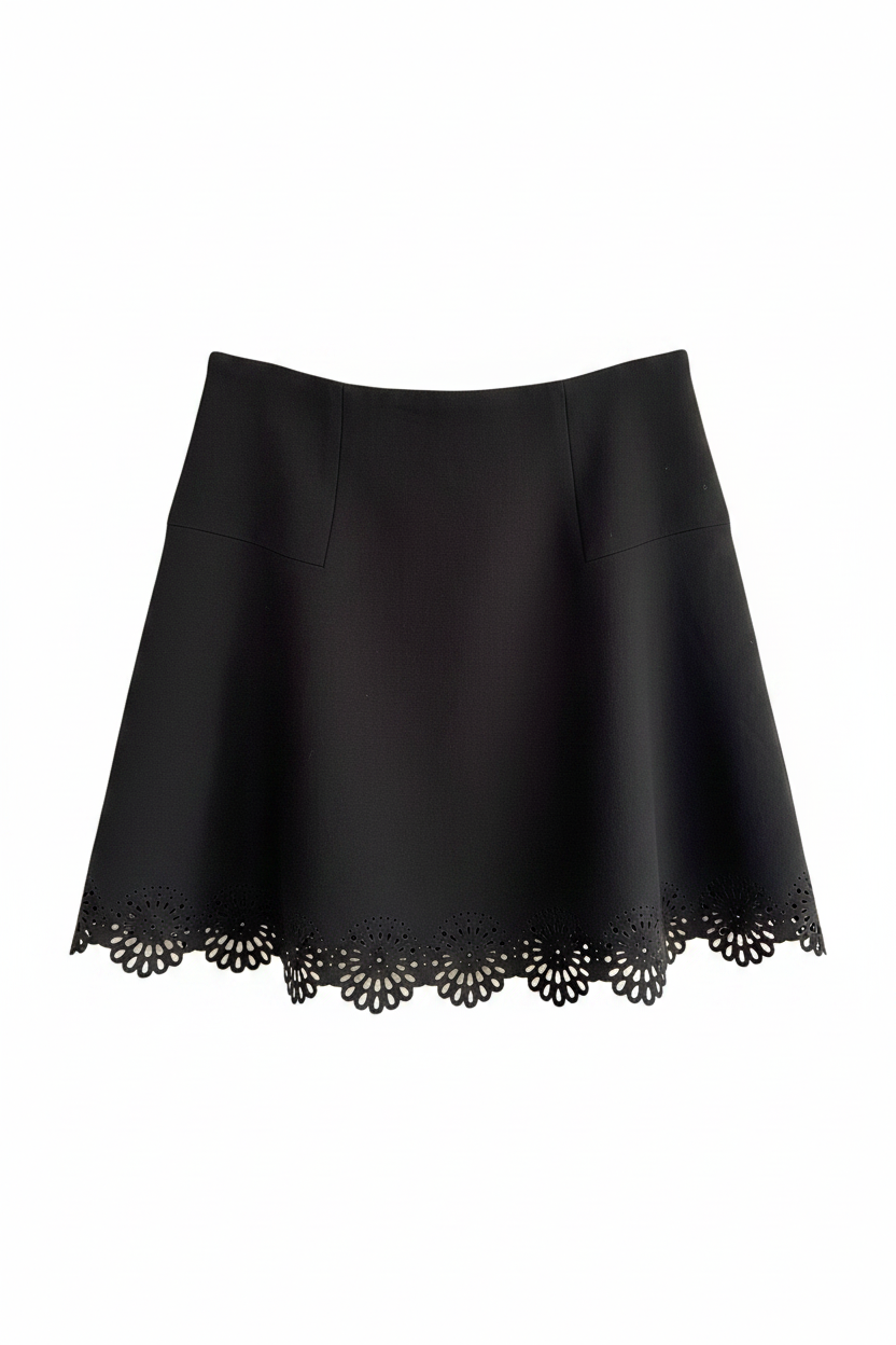 Black laser-cut skirt on white background