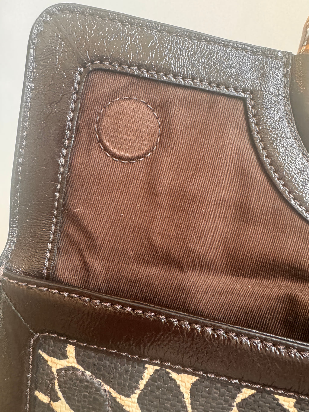 Picture of leather, cotton lining and magnetic purse closure