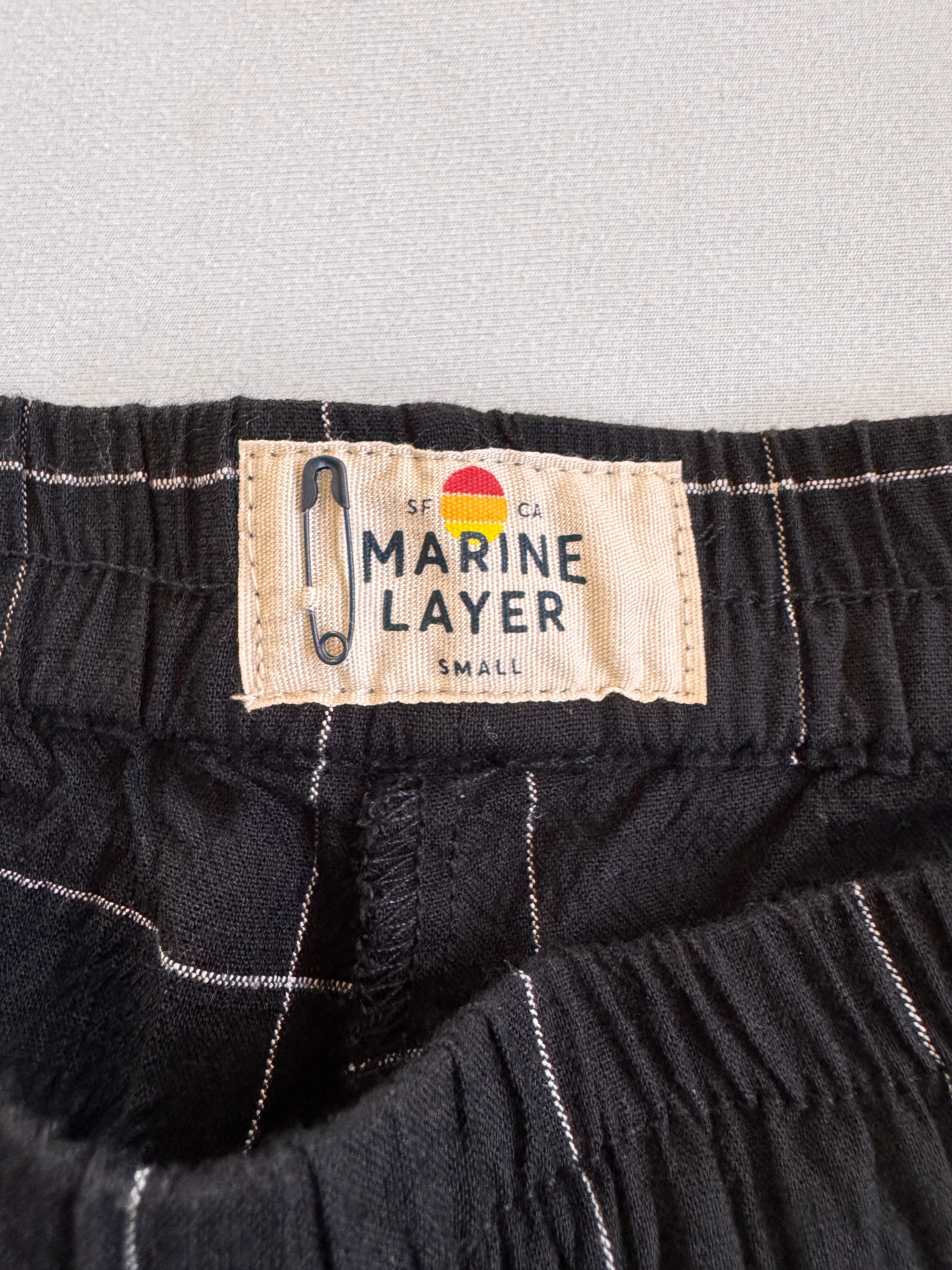Label inside pants showing brand and size