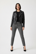 Woman wearing Marisa Skinny pants with heels and a moto jacket