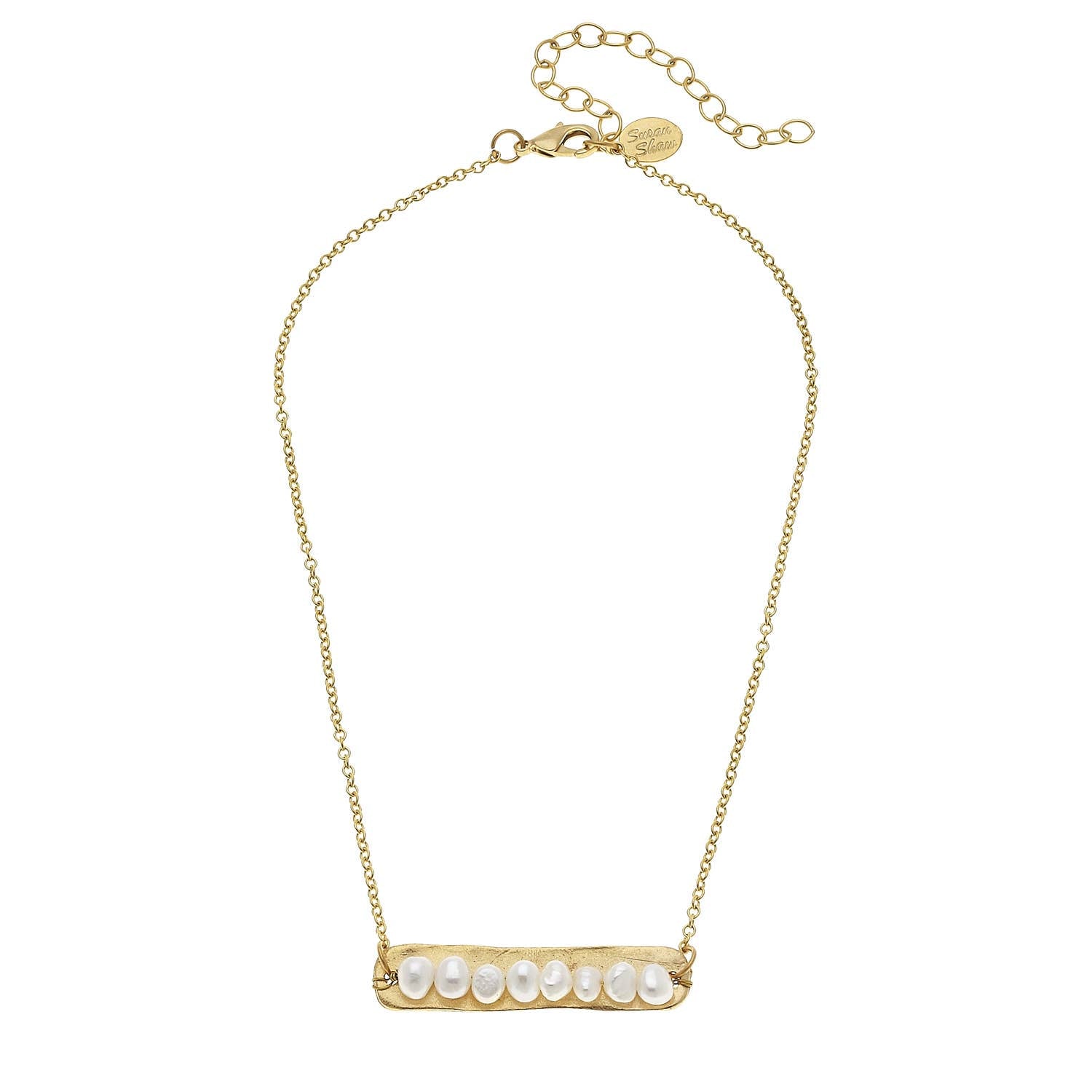 Gold necklace with a bar pendant featuring pearls on a white background