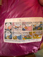 Comic-style illustration on a pink surface