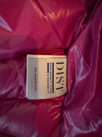 Close-up of a pink jacket with a 'DIST' label on it.