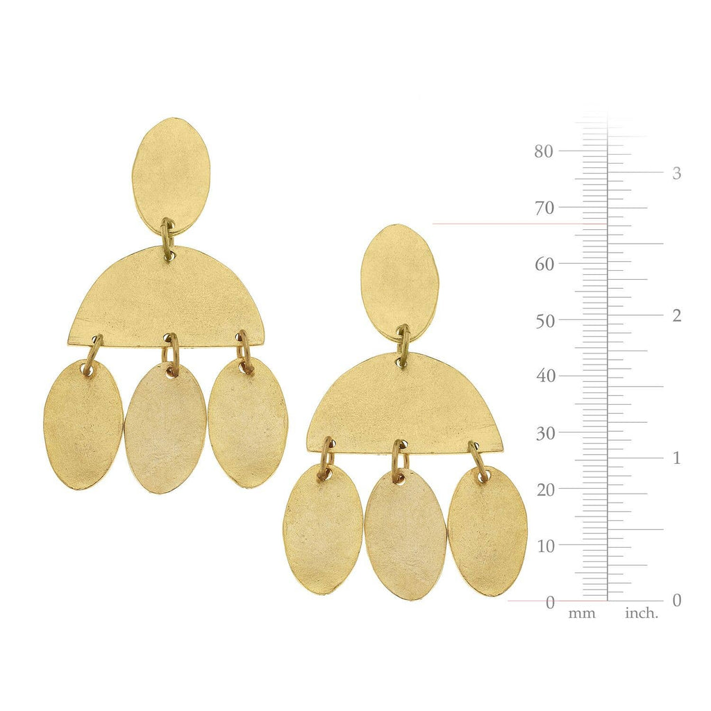 Gold earrings with oval shapes and a measurement scale on a white background