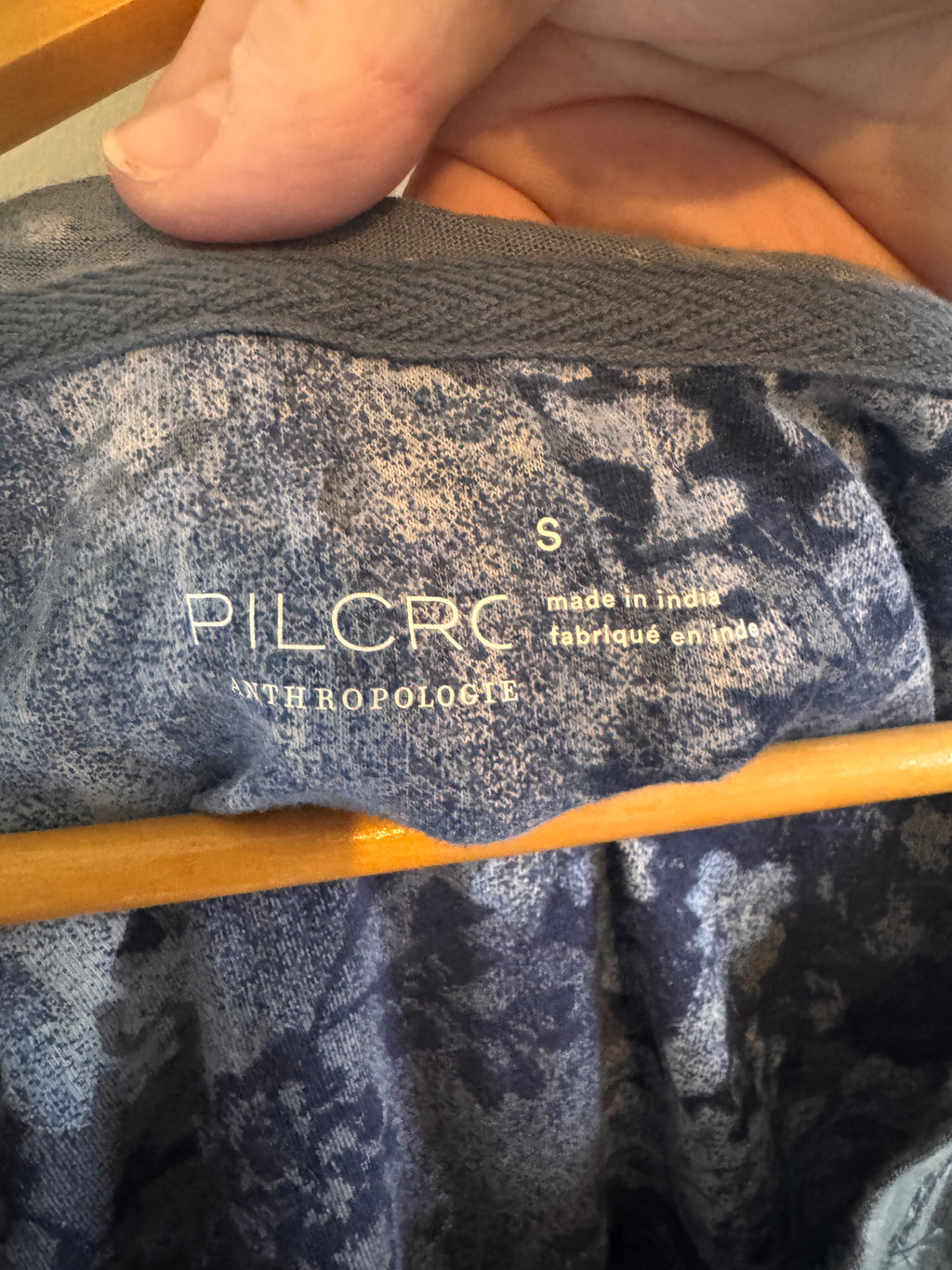 Close-up of a textured fabric with 'PILCRO' branding.