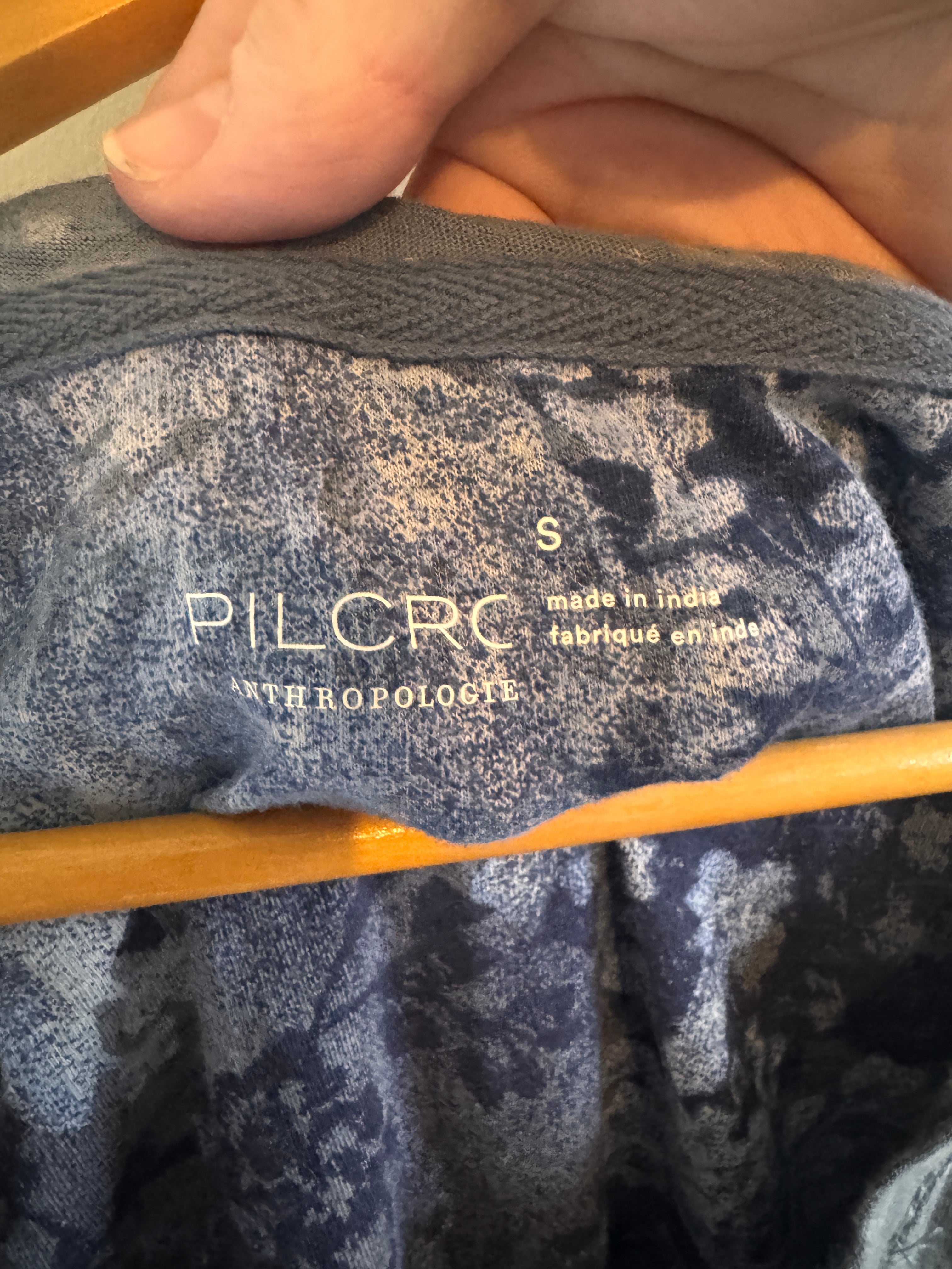 Close-up of a textured fabric with 'PILCRO' branding.