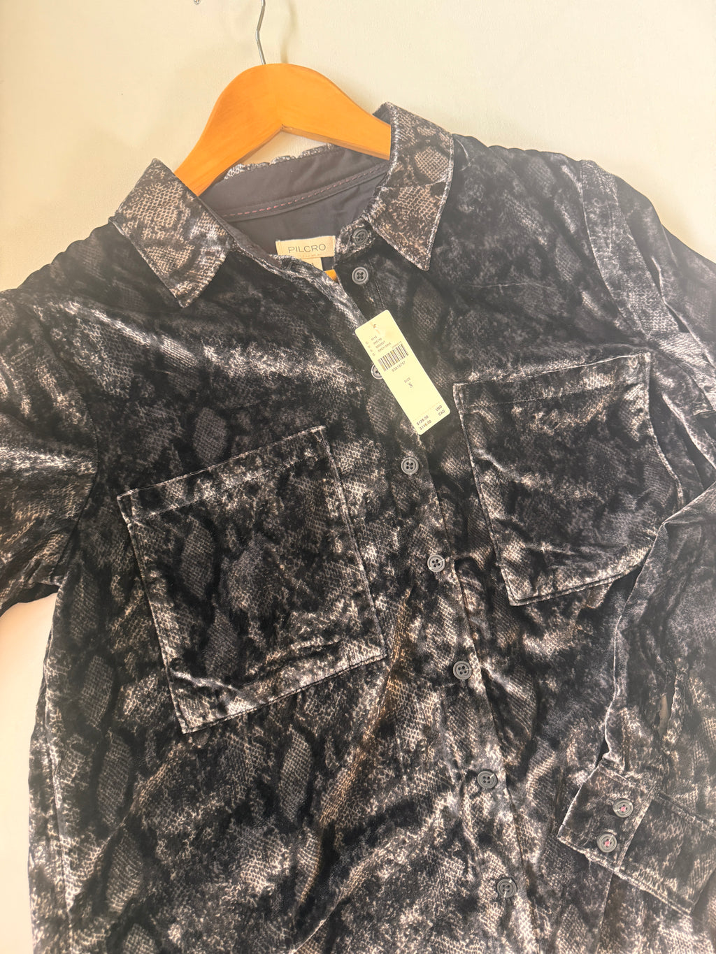 Snake pattern shirt on light background