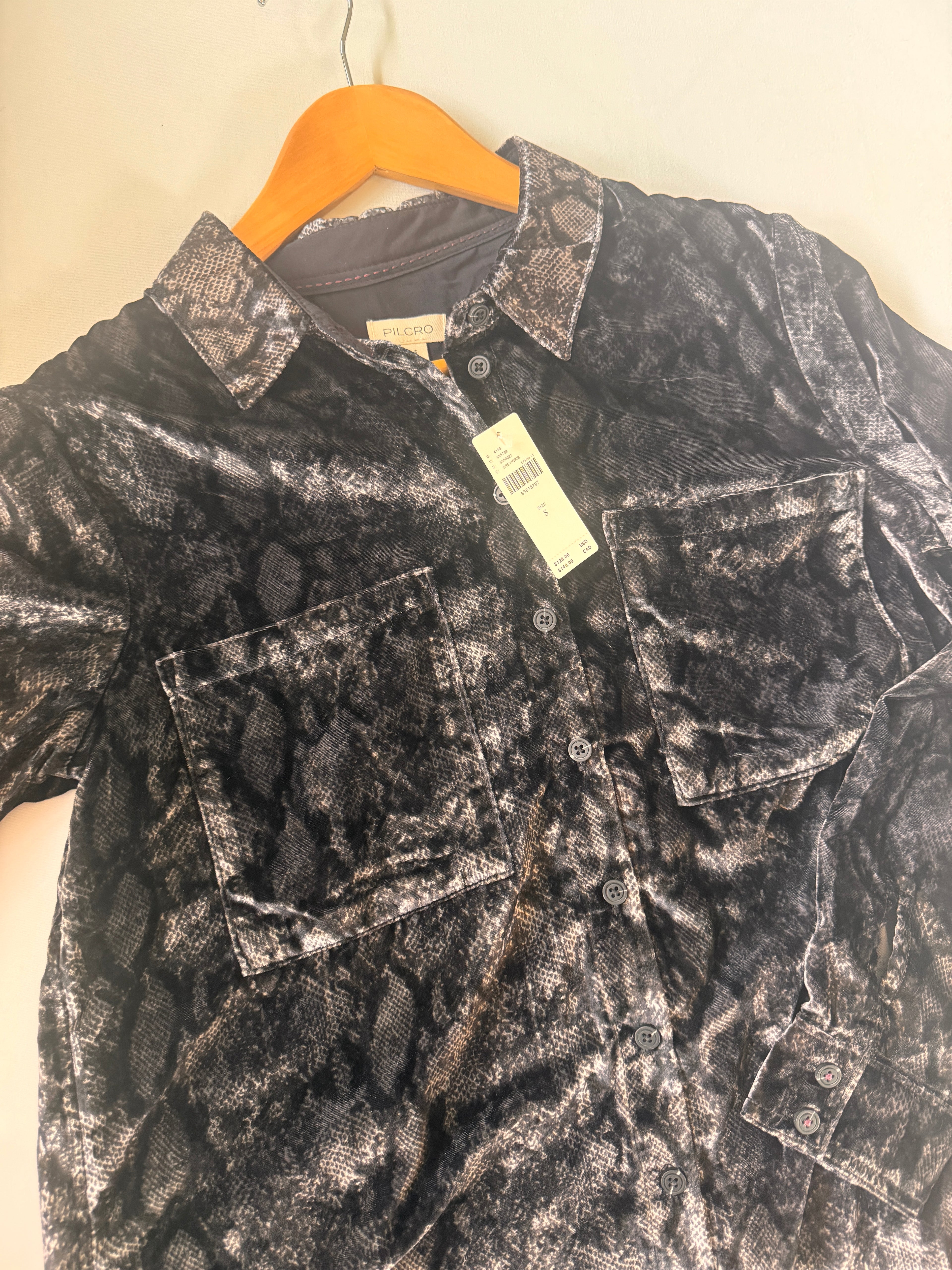 Snake pattern shirt on light background