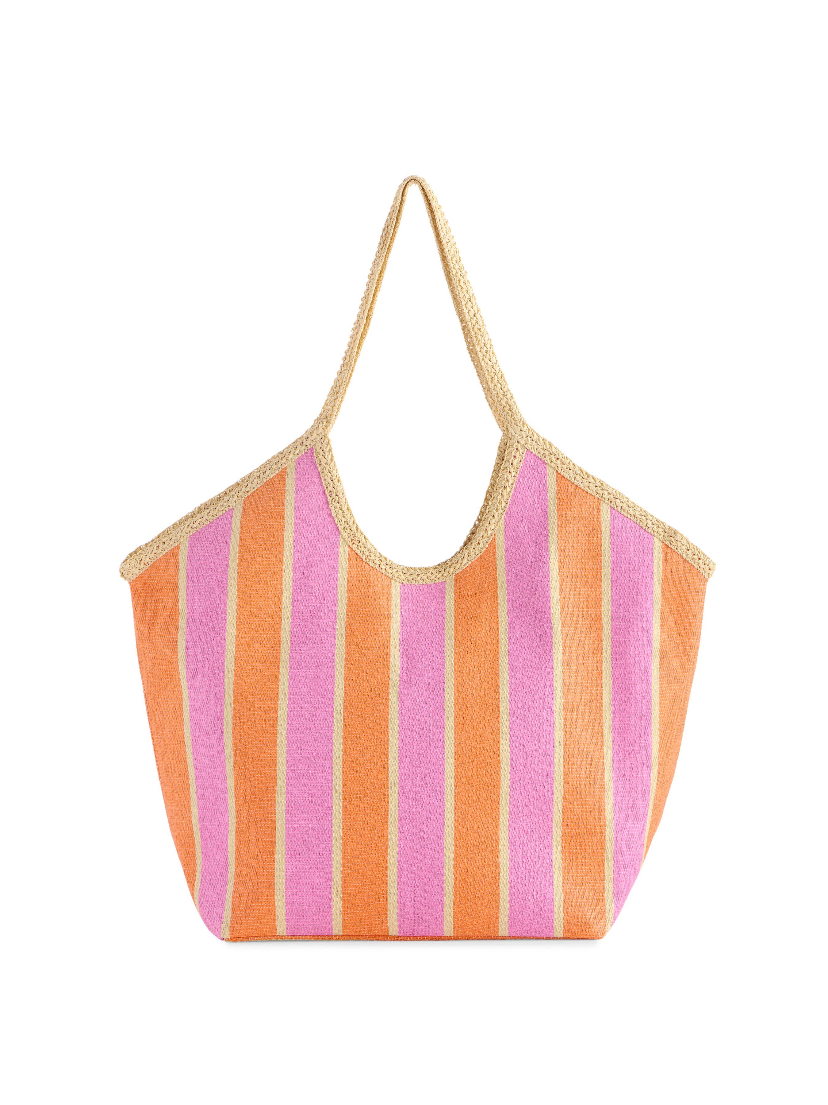 Striped orange and pink bag with a gold handle on a white background