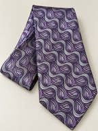 A purple and silver paisley patterned necktie, folded to show its texture and pattern, set against a plain light beige background.