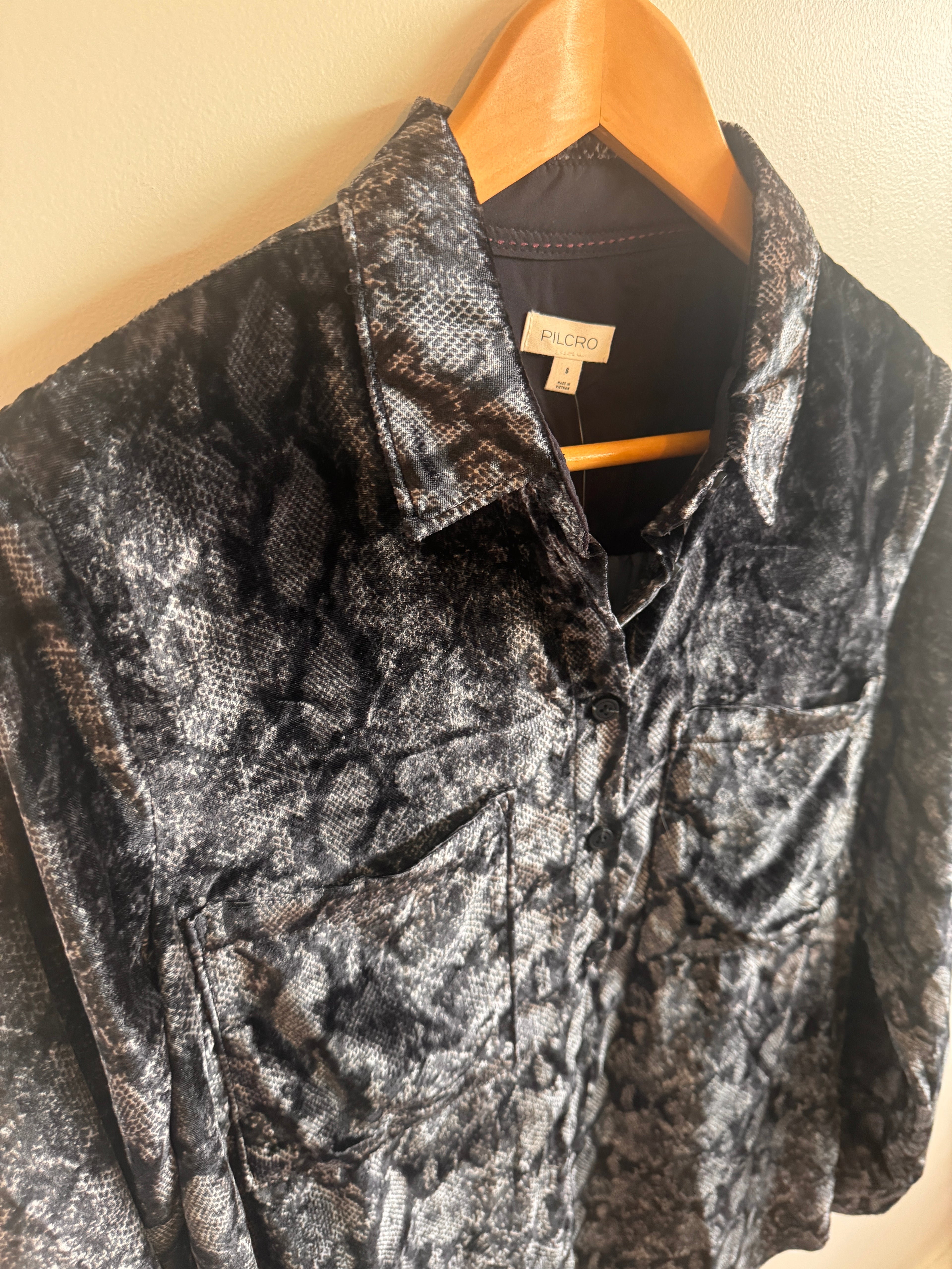 Black and gray shirt with snake print pattern