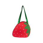 Strawberry-shaped bag with green handle on a white background