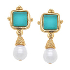 Gold earrings with turquoise square stones and white pearls on a white background