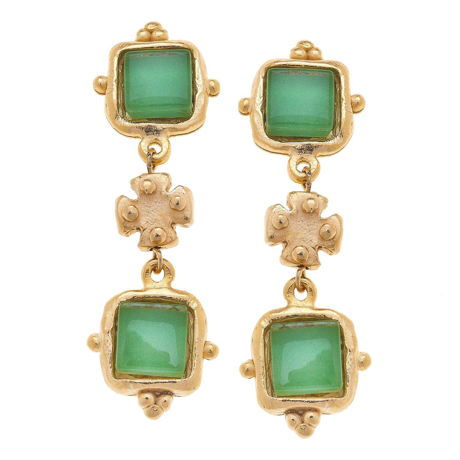 Gold earrings with green gemstones on a white background