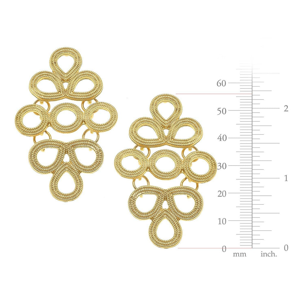Gold earrings with intricate design and a measurement scale on a white background