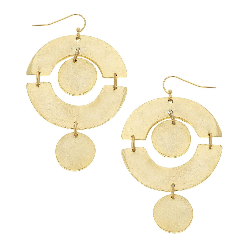 Gold circular earrings on a white background