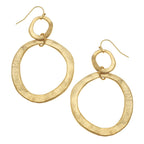 Gold hoop earrings on a white background