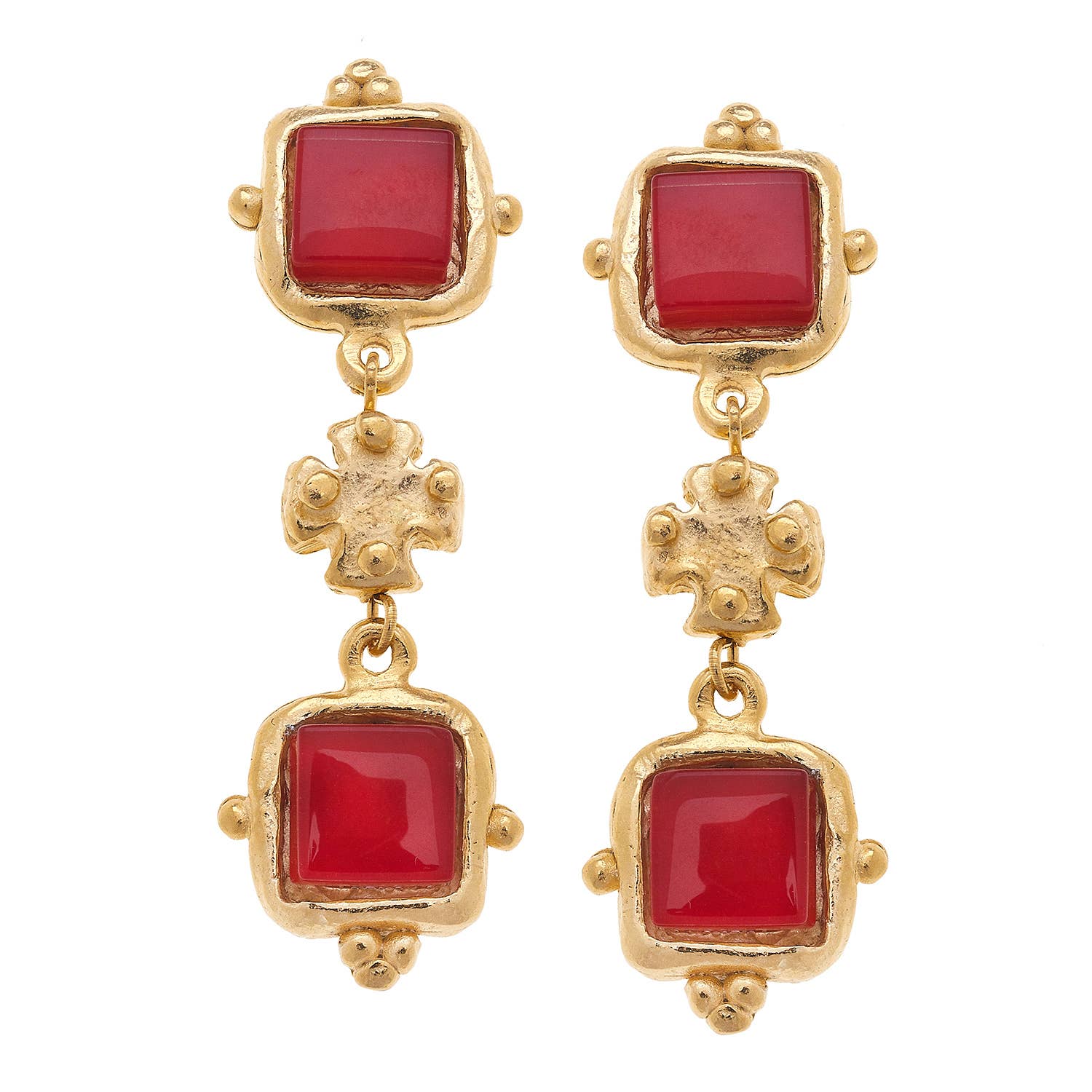 Gold earrings with red square stones on a white background