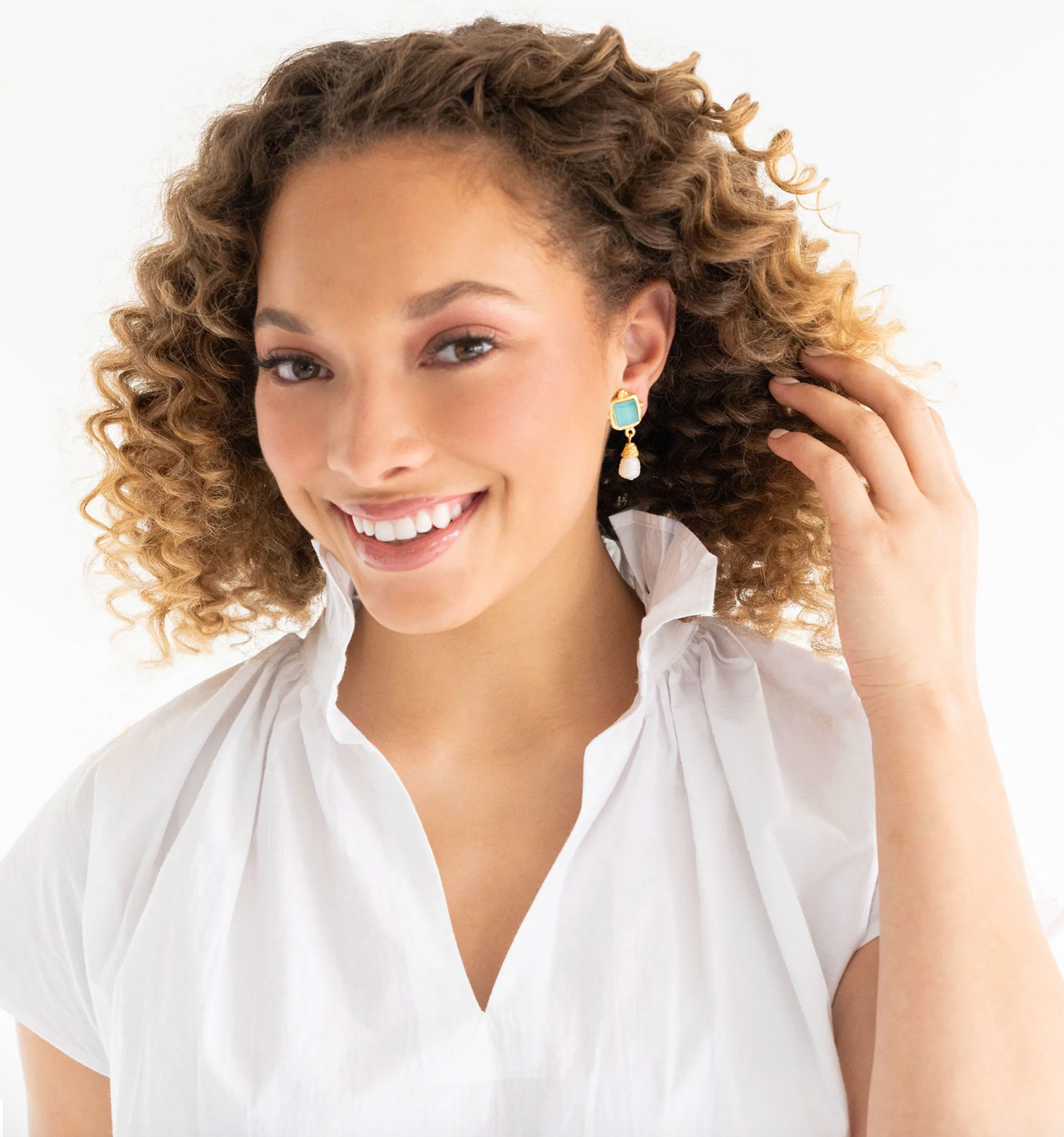 Model showcasing Susan Shaw Riviera Teal Charlotte Earrings