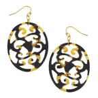 Pair of black and gold earrings on a white background