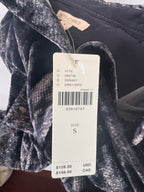 Price tag featuring original price and style of Anthropologie top